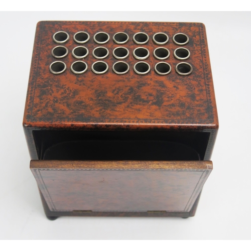 1247 - A musical cigarette box with twenty one receptacles, a operating hinged front enclosing an ashtray. ... 