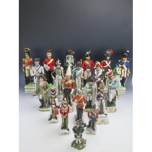 1279 - A collection of china figurines dressed in Napoleonic period uniforms and other military figures. (a... 