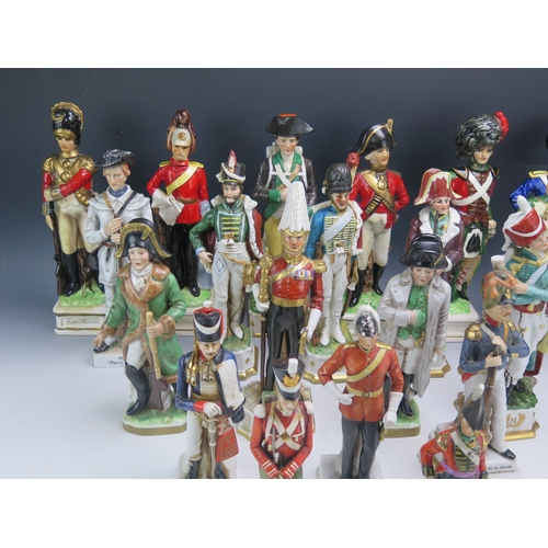 1279 - A collection of china figurines dressed in Napoleonic period uniforms and other military figures. (a... 