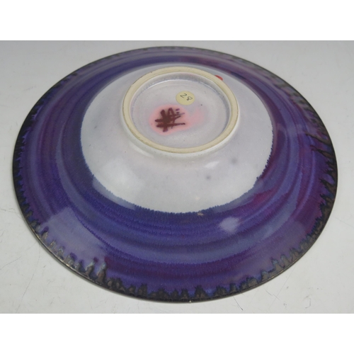 1284 - An Alan Julian Belmont? Studio Pottery Bowl with purple lustre glaze, 23.5cm diam., underglaze paint... 