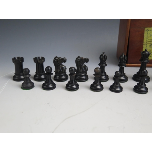 1309 - Jaques & Son Ltd, a Staunton pattern chess set, in boxwood and ebonised wood, The black king stamped... 