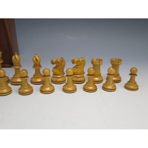 1309 - Jaques & Son Ltd, a Staunton pattern chess set, in boxwood and ebonised wood, The black king stamped... 