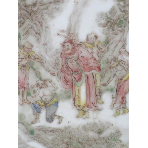 1424 - A Japanese porcelain panel decorated with figures in a wooded landscape, 15 x 10cm.