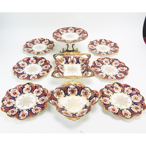 1447 - An Ansley part fruit service, includes comport two dishes and six plated decorated in the Imari styl... 