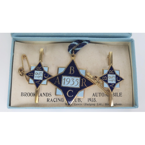 1539D - A boxed set of three BARC Brooklands member's and guest's lapel badges, 1935, number 1283, in blue a... 