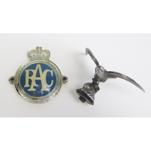 1541 - A chrome plated car mascot in the form of a swift or swallow, and an RAC car badge.