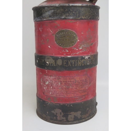 1548 - The 'Star' fire extinguisher,  of cylindrical form with rubber and canvas bound hose, 52cm high.