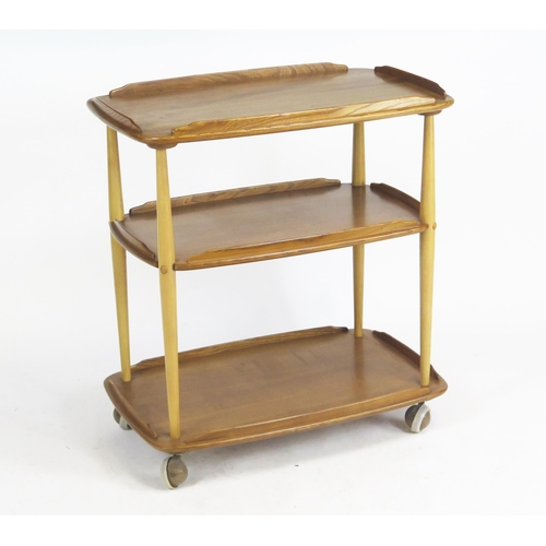 1645 - An Ercol Elm Three Tier Tea Trolley