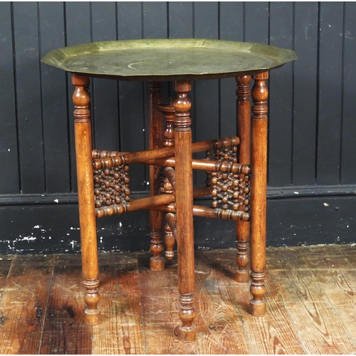 1652 - A Brass Top Tiffin Table, 57cm diam.