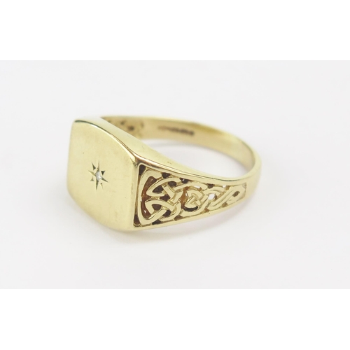 17 - A 9ct Gold and Diamond Signet Ring with pierced Celtic design shoulders, size T.5, hallmarked, 4.76g