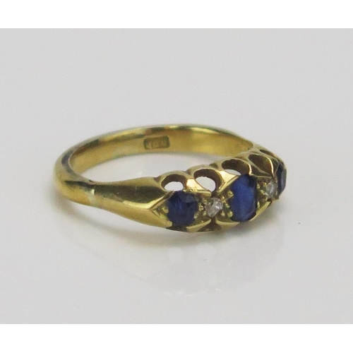 174 - An 18ct Gold, Sapphire and Diamond Five Stone Ring, c. 4.6x3.2mm principal stone, size L.5m, engrave... 