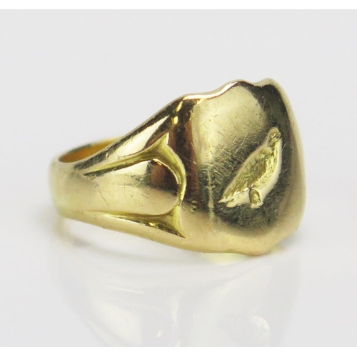 190 - An 18ct Gold Seal Ring engraved with a bird, size L, hallmarked, 6.53g