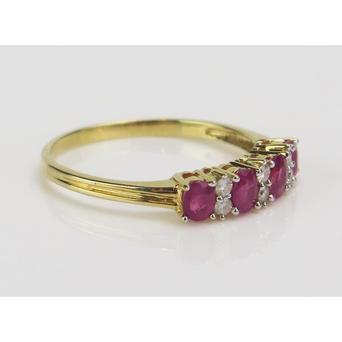 200 - An 18ct Gold, Ruby and Diamond Ten Stone Ring, size R.5, CCM mark, 3g