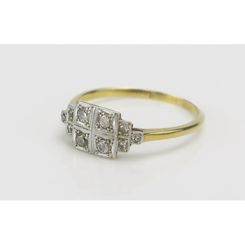 216 - An Art Deco Diamond and Millegrain Platinum Set Ten Stone Ring, size P.5, stamped 18CT PT (rubbed), ... 