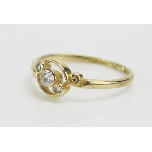 222 - An Antique 18ct Gold and Old Cut Diamond Three Stone Crossover Ring, c. 2.94mm rub over set principa... 