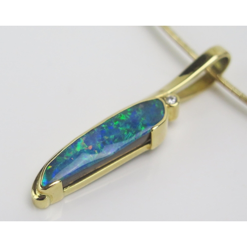 228 - An 18ct Gold, Natural Boulder Opal and Diamond Pendant on a silver gilt chain, 22.55g Boxed and with... 