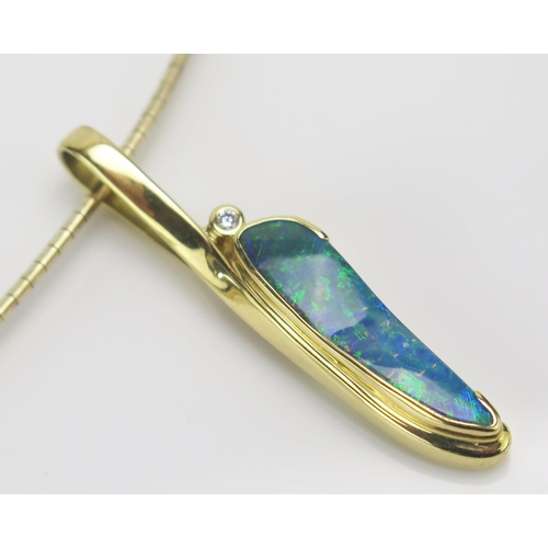 228 - An 18ct Gold, Natural Boulder Opal and Diamond Pendant on a silver gilt chain, 22.55g Boxed and with... 