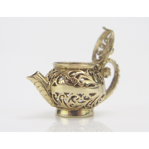 235 - A 9oct Gold Teapot Charm with hinged lid, hallmarked, 4.47g