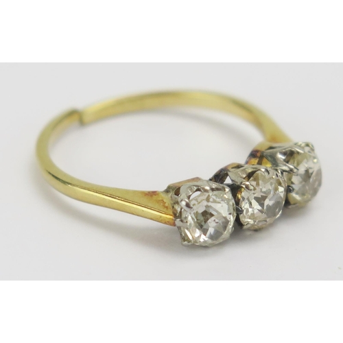 28 - An 18ct Gold and Old Cut Diamond Three Stone Ring, central stone c. 4.8mm, size M.5, stamped 18CT, 2... 