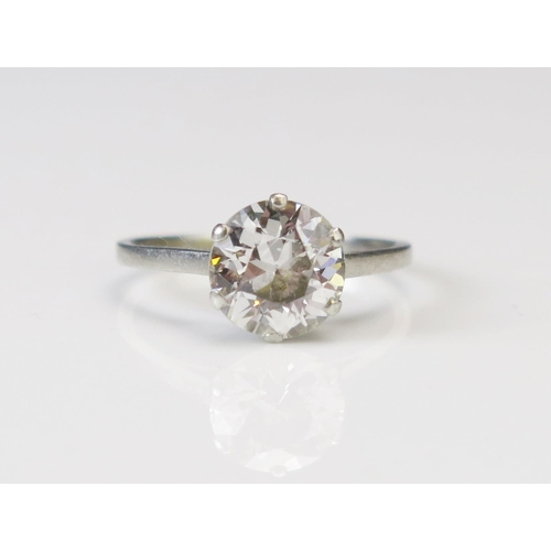 323 - A Natural Brilliant Round Cut Diamond Solitaire Ring in a precious white metal setting, size M.75, 8... 