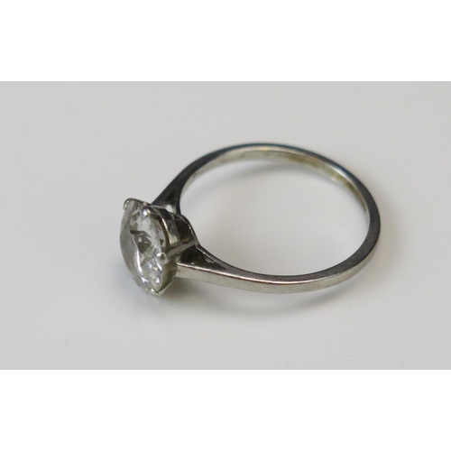 323 - A Natural Brilliant Round Cut Diamond Solitaire Ring in a precious white metal setting, size M.75, 8... 