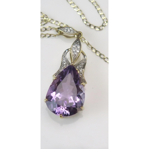 329 - A 9ct Gold, Amethyst and Diamond Pendant, 39.4mm drop, and on a 9ct gold chain, 51cm, 5.96g