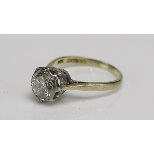 339 - An 18ct Gold and Brilliant Cut Diamond Solitaire Ring, c. 6.7mm natural stone, size L.25, Birmingham... 