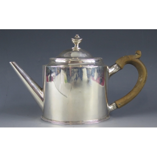 504 - A George III silver teapot, maker Hester Bateman, London, 1786, of plain oval form, with beaded rims... 