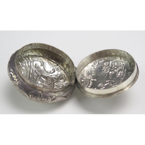 527 - A continental silver circular snuff box, stamped marks, decorated with a prancing stag, 6cm diameter... 