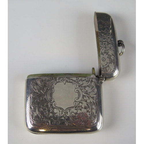 540 - An Edward VII silver vesta case, maker Hamilton & Co, Chester 1902, of square outline, with chased f... 