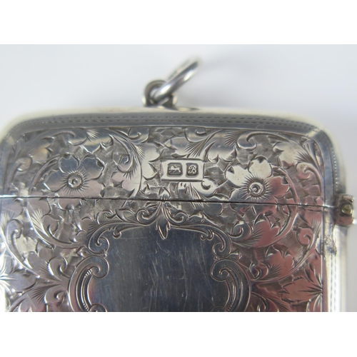 540 - An Edward VII silver vesta case, maker Hamilton & Co, Chester 1902, of square outline, with chased f... 