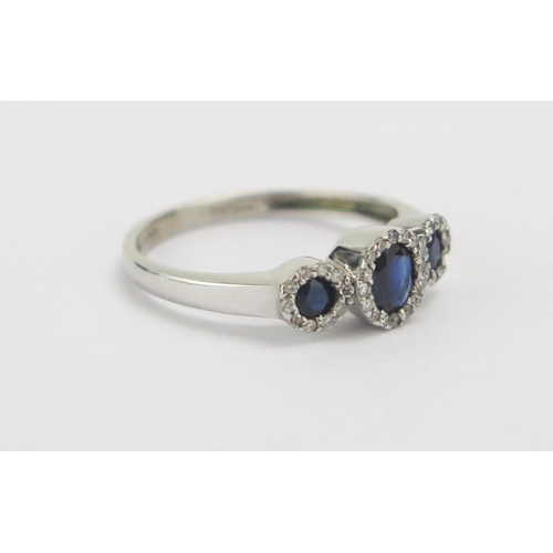 59 - A 9ct White Gold, Sapphire and Diamond Ring, size M.5, CCM mark, 2.57g