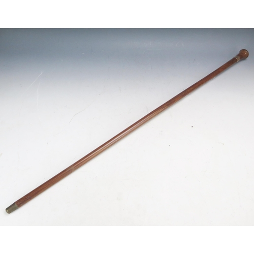 590A - A polished wood and 9ct gold mounted walking stick, initialled, 81cm long.