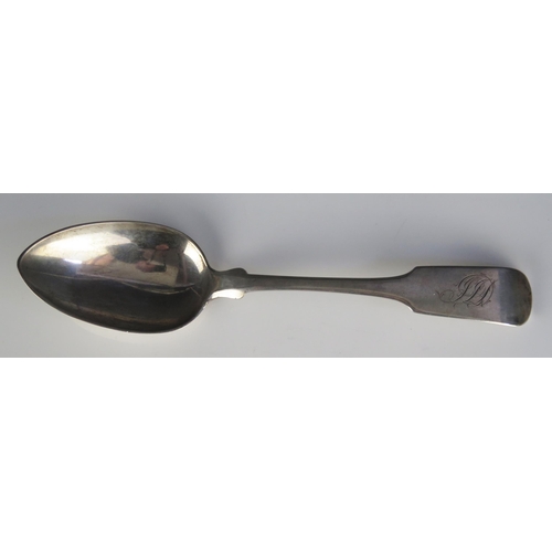 637 - An early 19th century silver Fiddle pattern table spoon, possibly Canadian, maker B.G, monogrammed, ... 