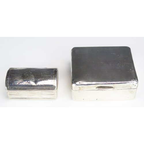 669 - A continental white metal snuff box of rectangular outline, 7cm wide, together with a silver cigaret... 