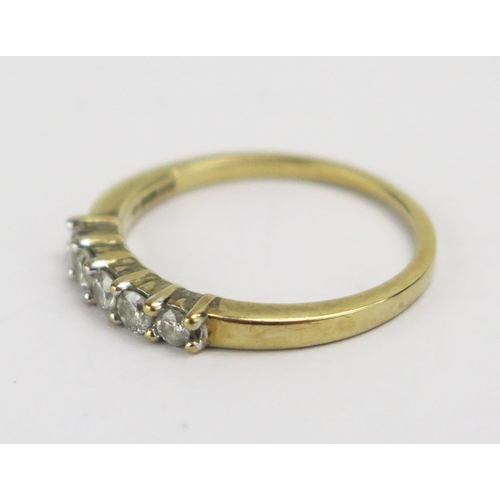 67 - A 9ct Gold and Diamond Five Stone Ring, c. 2.4mm brilliant round cuts, size K.75, hallmarked, 1.78g