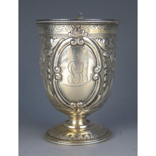 674 - A Victorian silver christening cup, maker Martin, Hall & Co, Sheffield, 1866, initialled, with embos... 