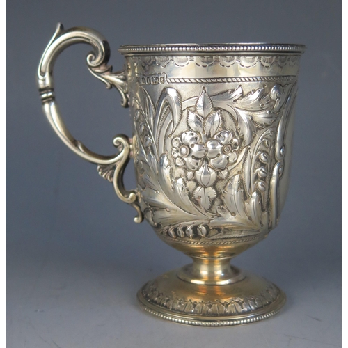 674 - A Victorian silver christening cup, maker Martin, Hall & Co, Sheffield, 1866, initialled, with embos... 