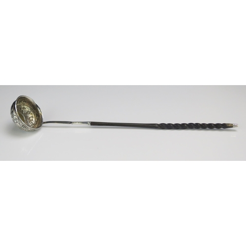 685 - A Georgian silver toddy ladle, unmarked, the circular bowl inset with George II coin  dated 1758, mo... 