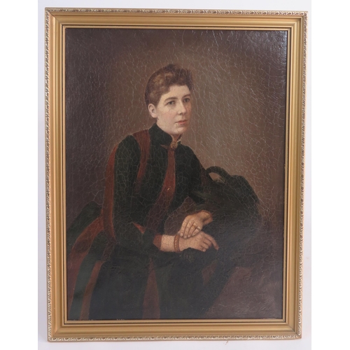 729A - Victorian half portrait of a lady resting at a table, oil on canvas (has been re - backed), 58 x 43c... 