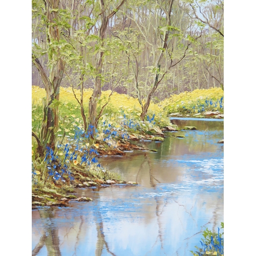 750 - Terry Evans b.1943, tranquil river scene with daffodils and bluebells, signed lower right, impasto o... 