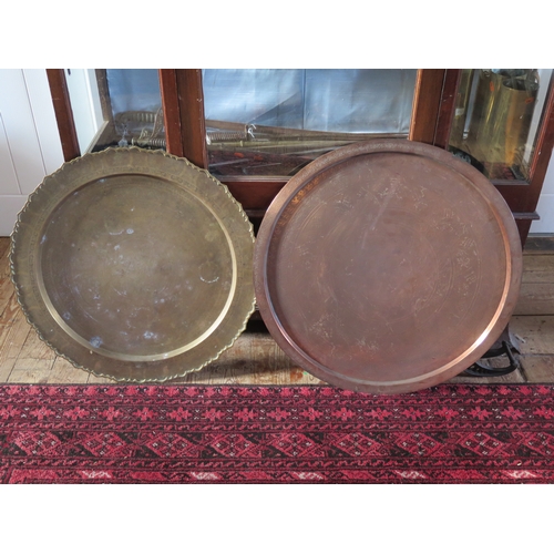 1652A - A Large Copper Table Top with Islamic script (70cm diam.) and an Indian brass example