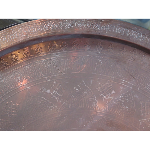 1652A - A Large Copper Table Top with Islamic script (70cm diam.) and an Indian brass example