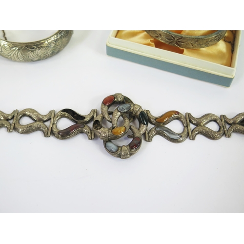 108 - Two Sterling Silver Hinged bangles with chased foliate decoration (45.42g) and a Victorian precious ... 