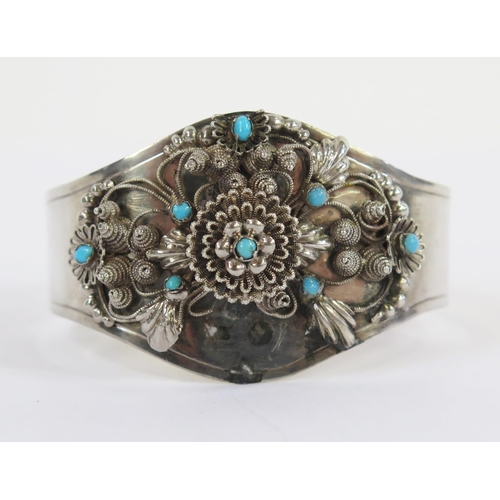 110 - A Georgian Silver Filigree and Turquoise Adjustable Bangle, lion passant and date letter n, 25.68g