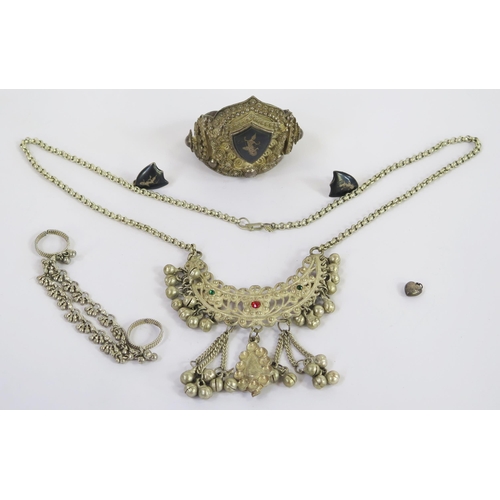 115 - A SIAM Sterling Silver and Niello Bangle, a pair of earrings, a heart pendant and Indian white metal... 