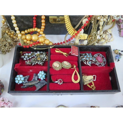 122 - A Selection of Costume Jewellery including necklaces and brooches, watches, etc.