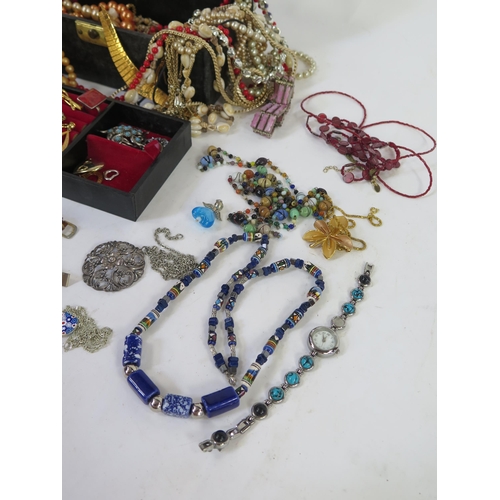 122 - A Selection of Costume Jewellery including necklaces and brooches, watches, etc.