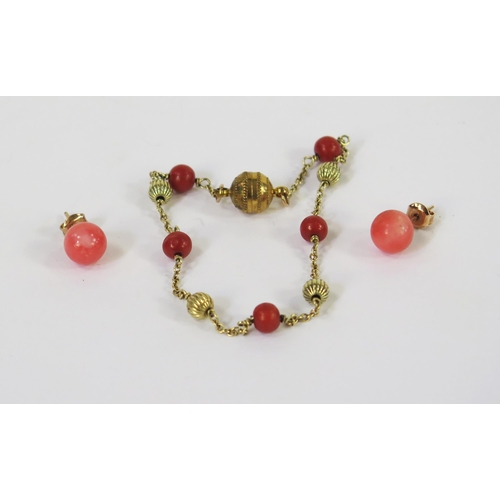 128 - A Pair of Coral Studs and a bracelet with magnetic clasp