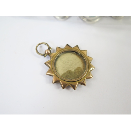 130 - An Antique 9ct Gold Double Sided Locket Pendant, 39.6mm drop, stamped 9CT, 5.47g